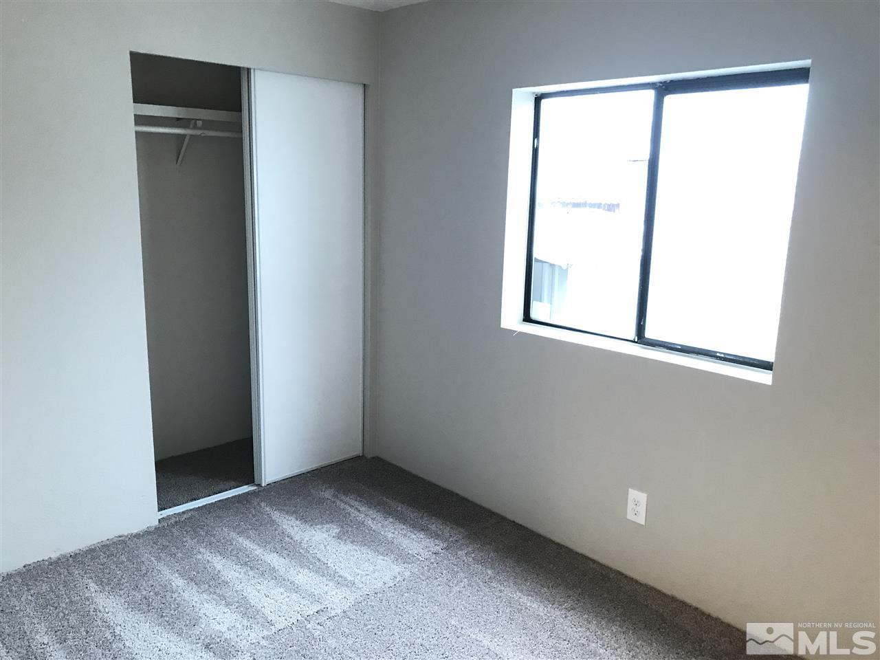 17400 Whippoorwill Lane Reno, NV 89508 - Photo 9 of 18 a view of an empty room with a window