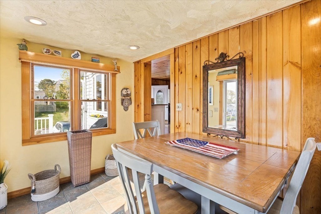 7 Glendale Road Wareham, MA 02558 - Photo 14 of 33 a living room with a table and chairs