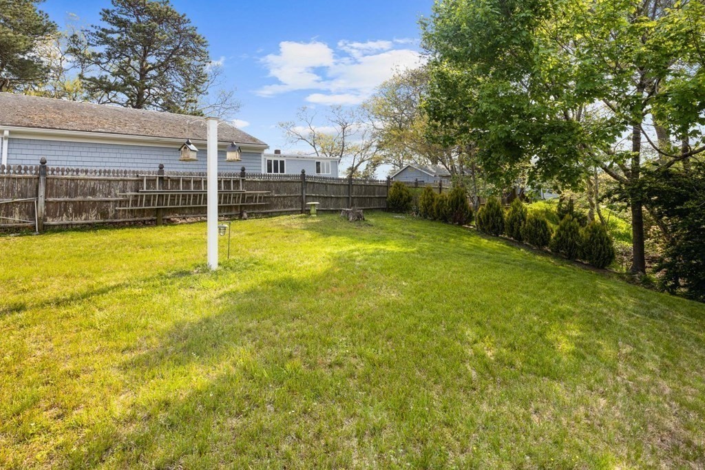 7 Glendale Road Wareham, MA 02558 - Photo 31 of 33 a view of a swimming pool with an outdoor seating and house in the background