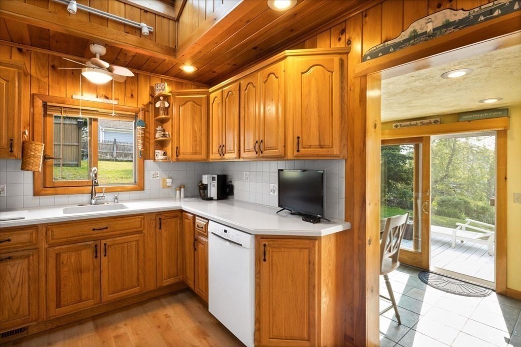 7 Glendale Road Wareham, MA 02558 - Photo 6 of 33 a kitchen that has a sink a stove and a microwave