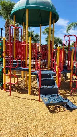 a view of walk in patio with a table and chairs