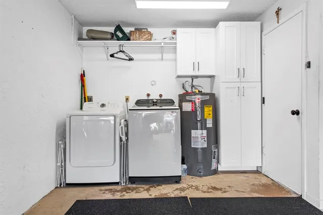 a view of cabinets and wooden floor