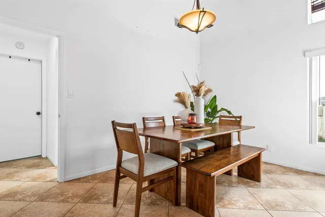 a view of a workspace with furniture