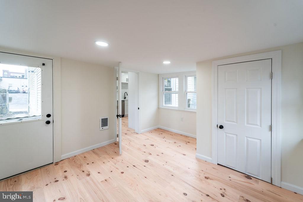 20 West Raspberry Street Bethlehem, PA 18018 - Photo 17 of 32 a view of a bedroom with wooden floor and window