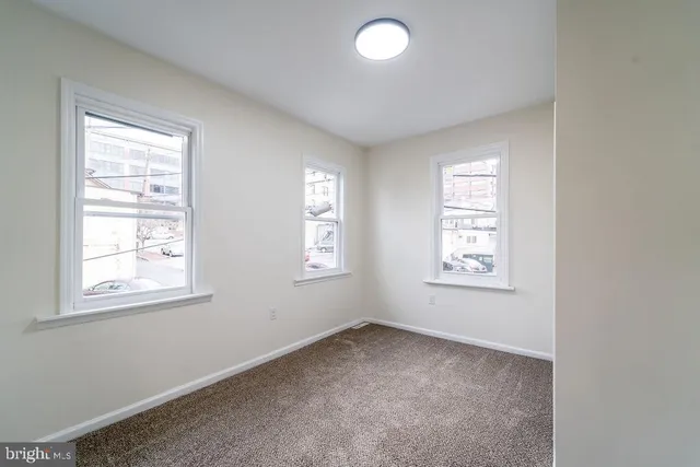 an empty room with windows