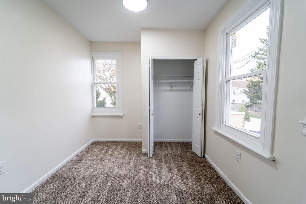 20 West Raspberry Street Bethlehem, PA 18018 - Photo 24 of 32 a view of empty room with wooden floor and fan