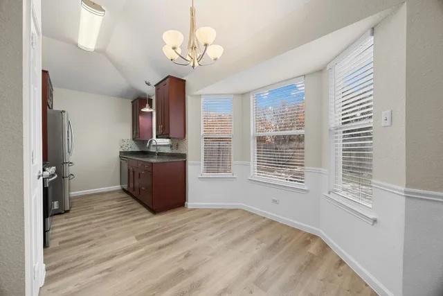 a view of kitchen and windows