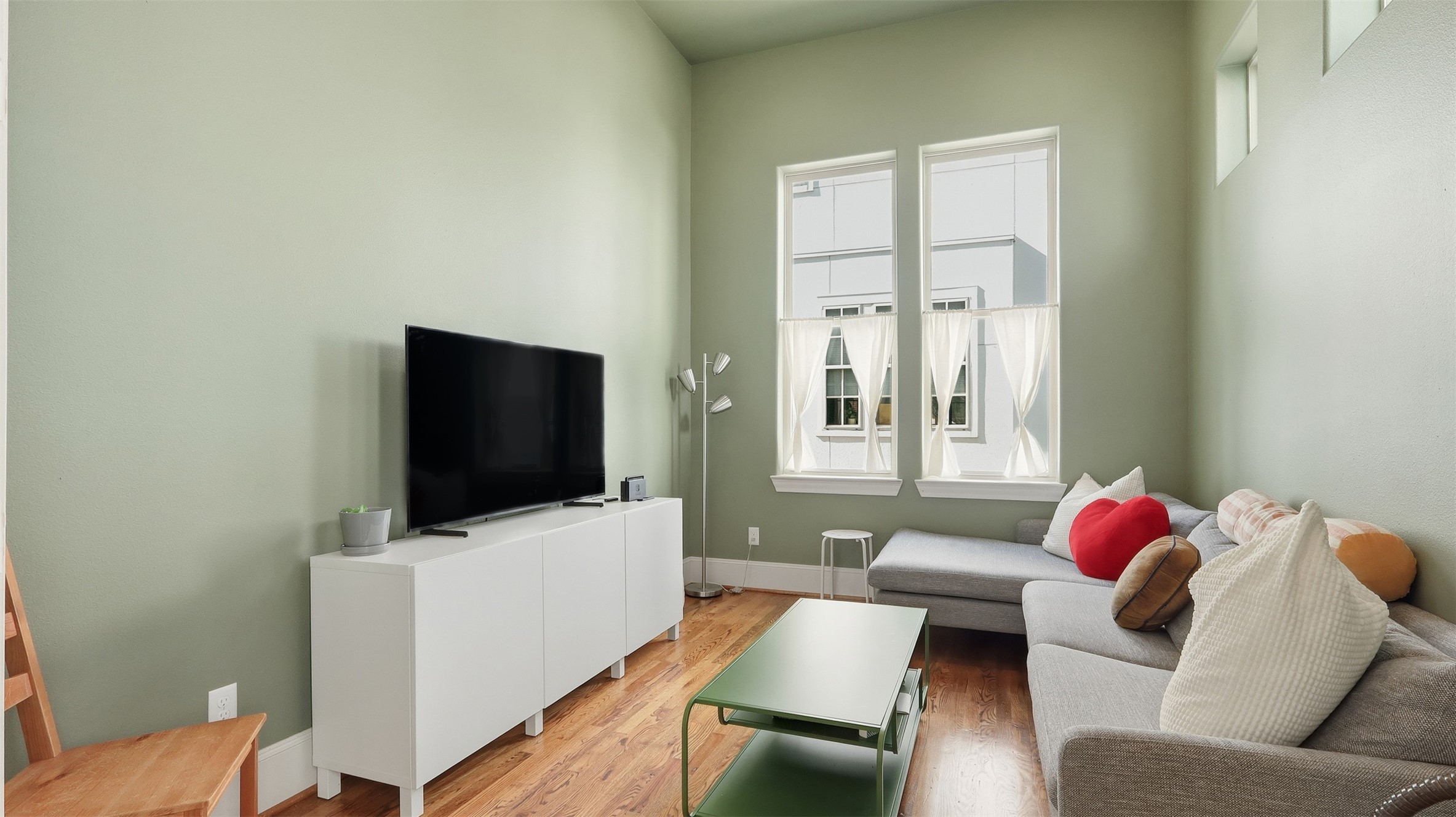 704 Paige Street Houston, TX 77003 - Photo 14 of 41 a living room with furniture and a flat screen tv