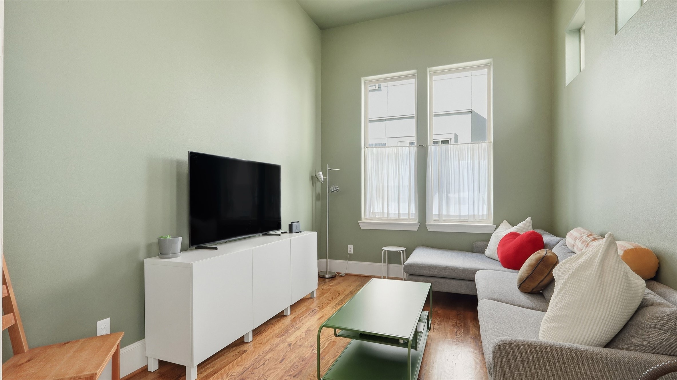 704 Paige Street Houston, TX 77003 - Photo 15 of 41 a living room with furniture and a flat screen tv