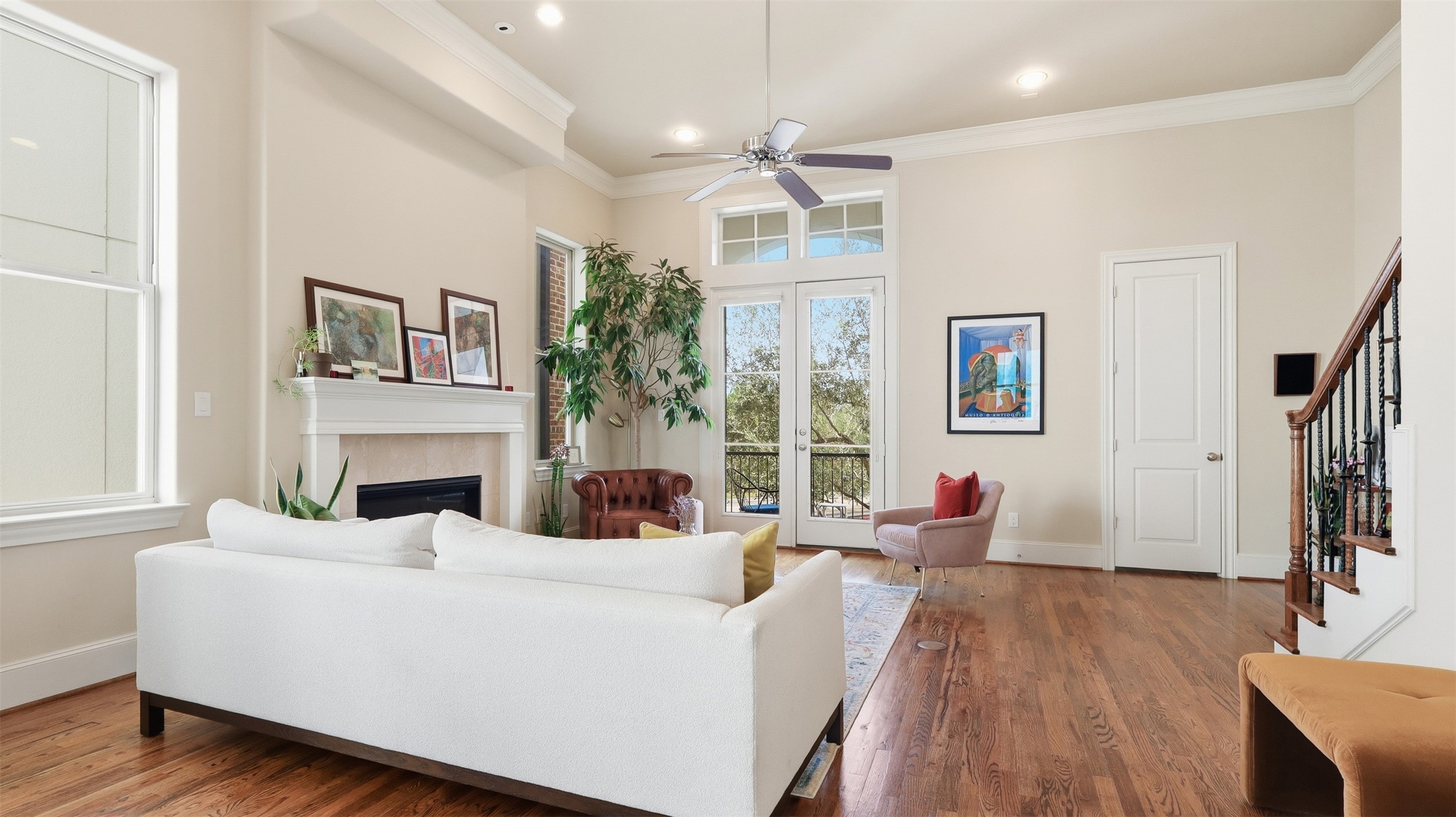 704 Paige Street Houston, TX 77003 - Photo 16 of 41 a living room with furniture a large window and a fireplace