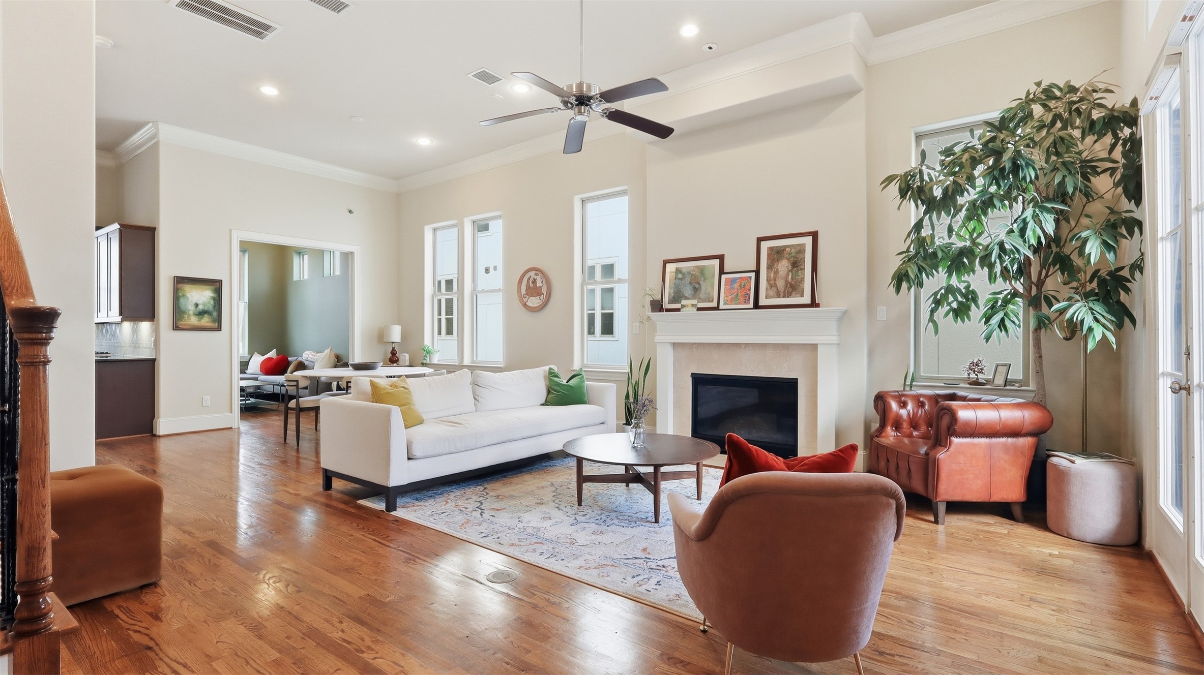 704 Paige Street Houston, TX 77003 - Photo 19 of 41 a living room with furniture a fireplace and a potted plant
