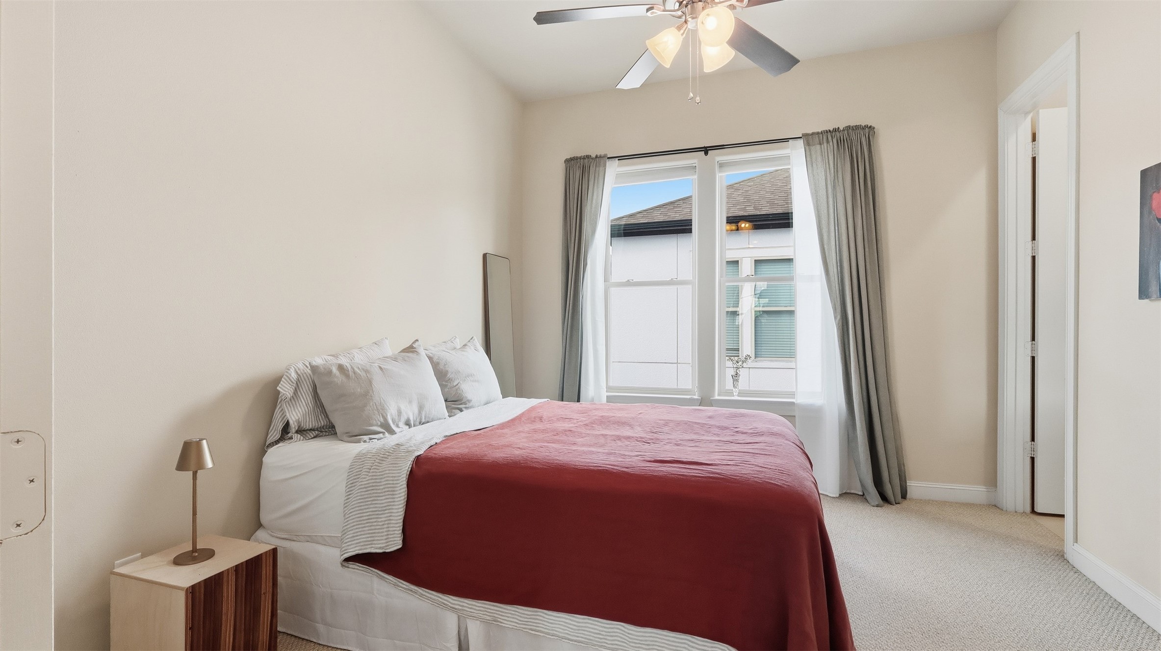 704 Paige Street Houston, TX 77003 - Photo 22 of 41 a bed room with a bed and a window