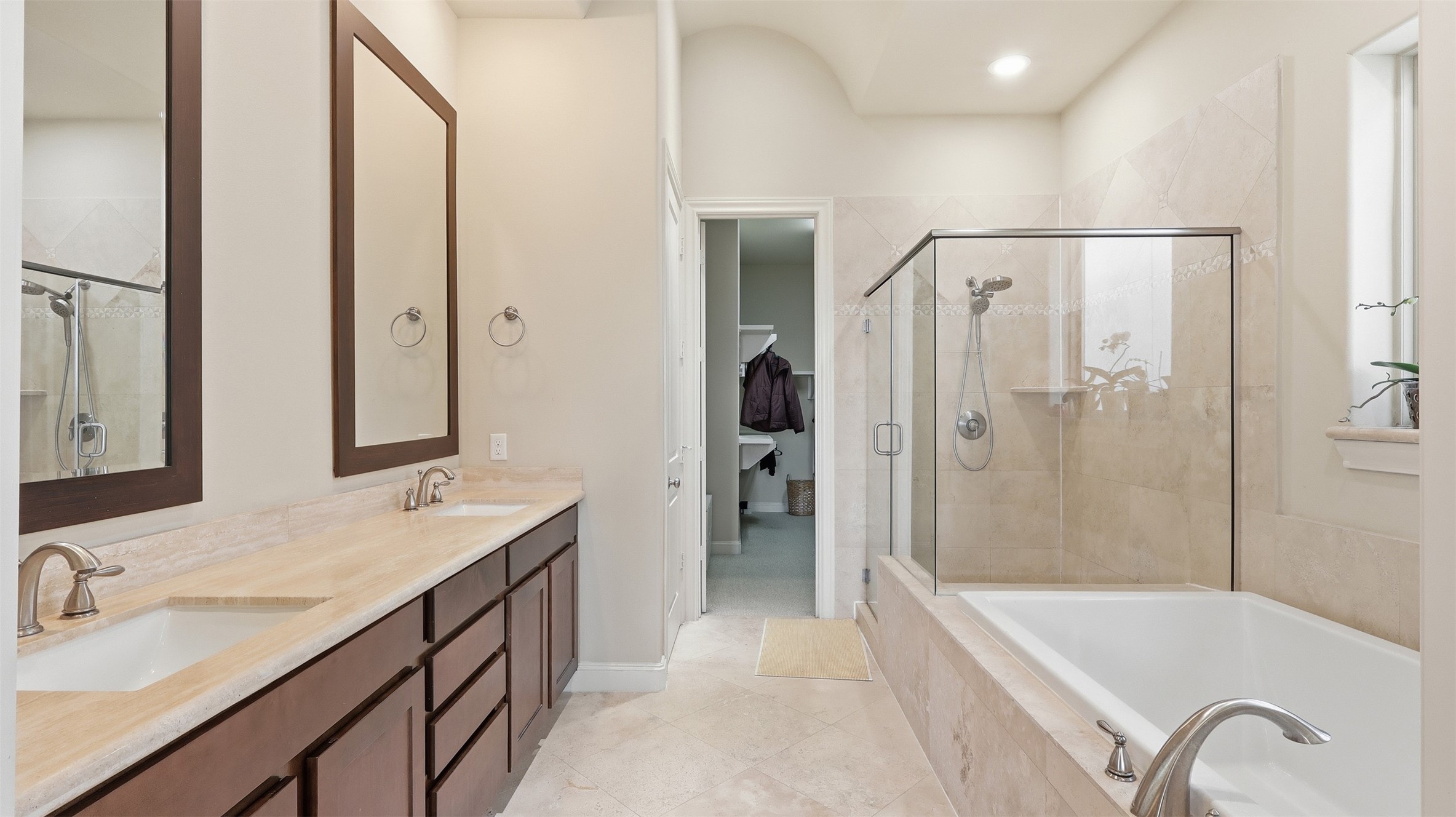 704 Paige Street Houston, TX 77003 - Photo 29 of 41 a bathroom with a tub sink shower and mirror