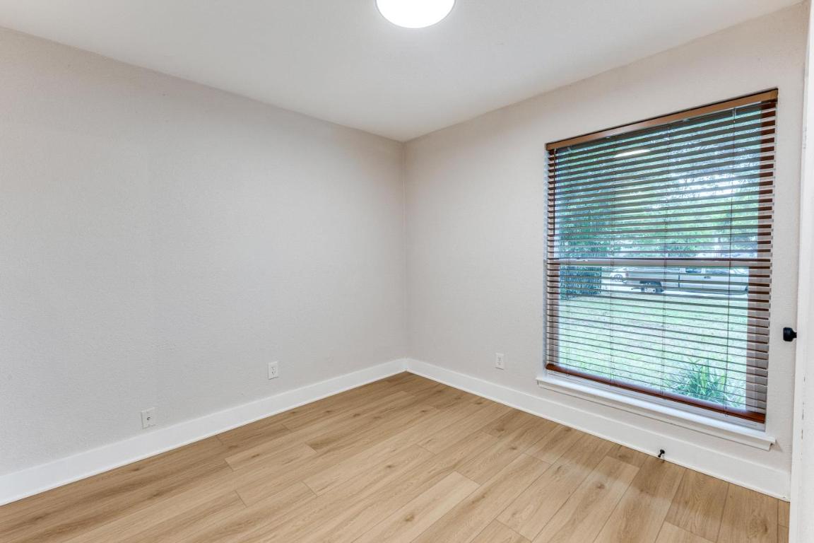 5617 Tallow Tree Drive Austin, TX 78744 - Photo 17 of 25 a view of a room that has a window in it