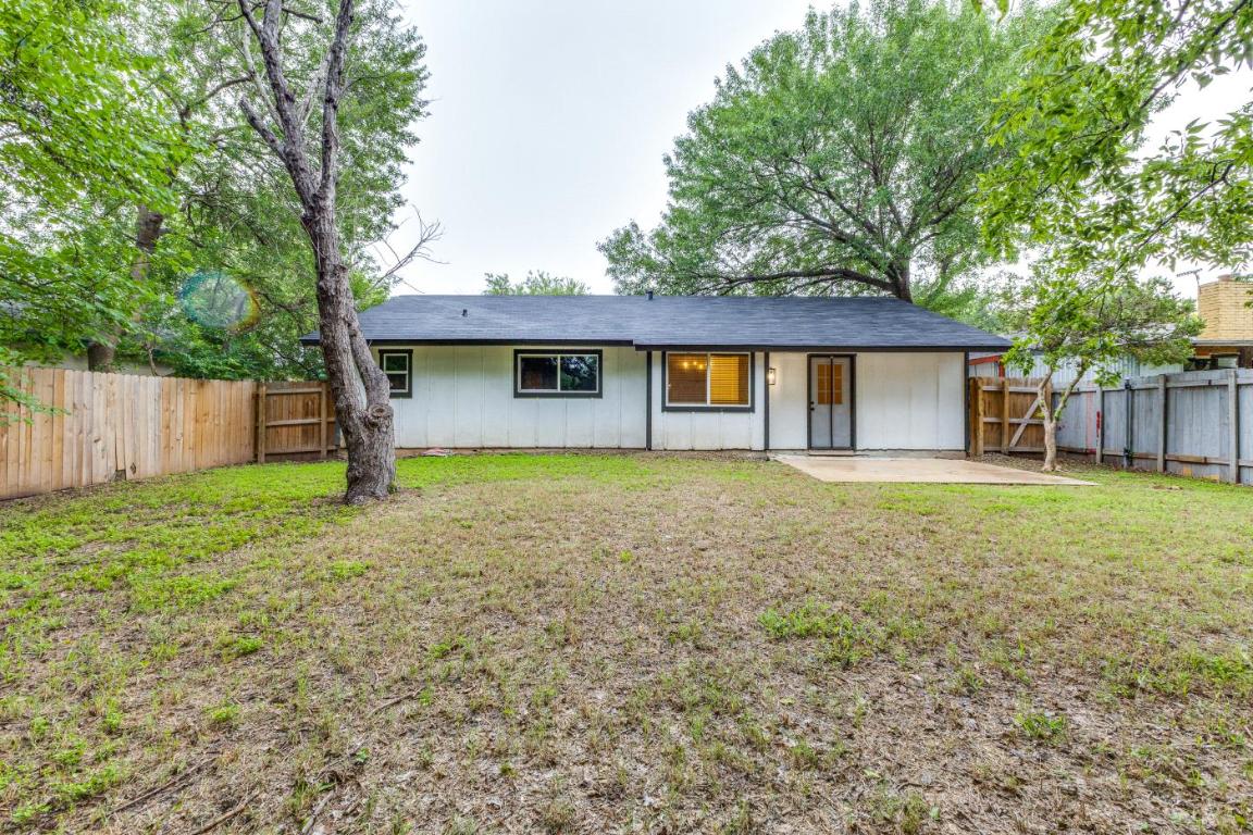 5617 Tallow Tree Drive Austin, TX 78744 - Photo 25 of 25 a front view of house with yard and green space