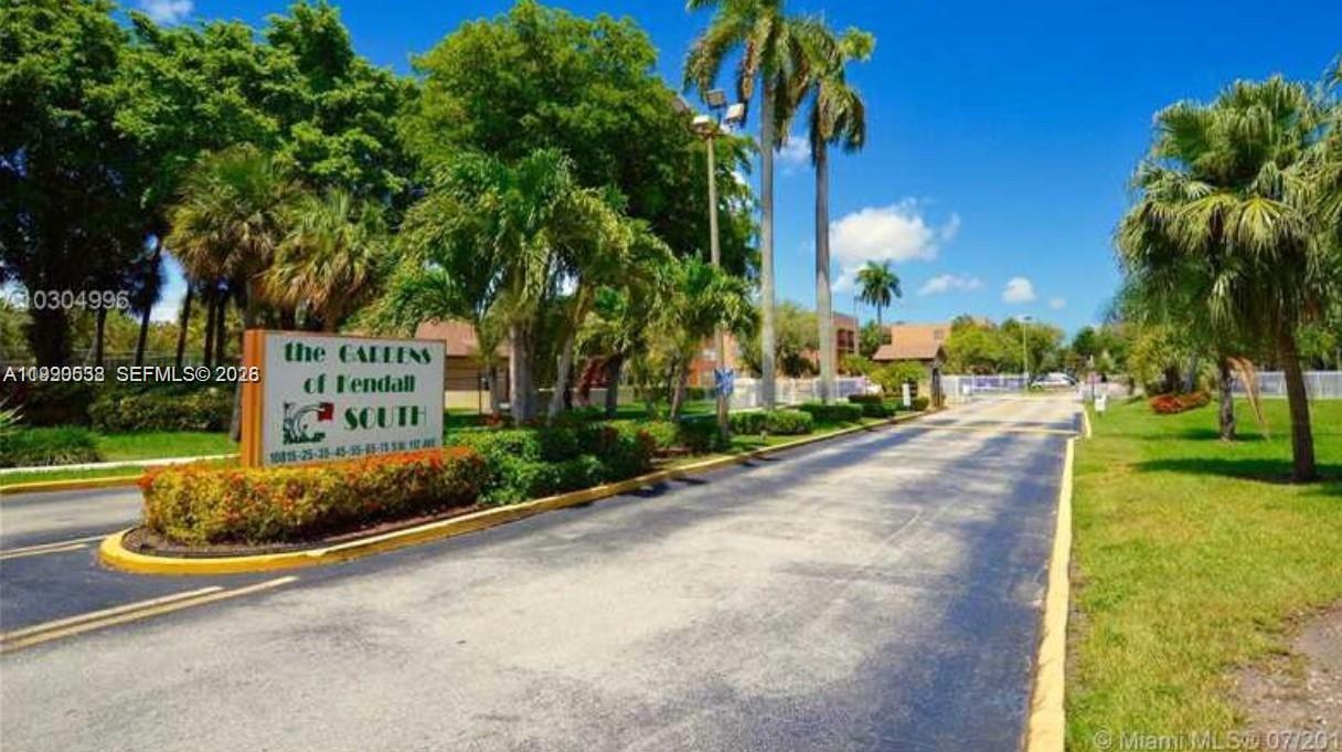 10845 Southwest 112th Avenue, Unit 211 Miami, FL 33176 - Photo 1 of 12 a view of a street with palm trees