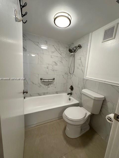 10845 Southwest 112th Avenue, Unit 211 Miami, FL 33176 - Photo 11 of 12 a bathroom with a toilet and a shower