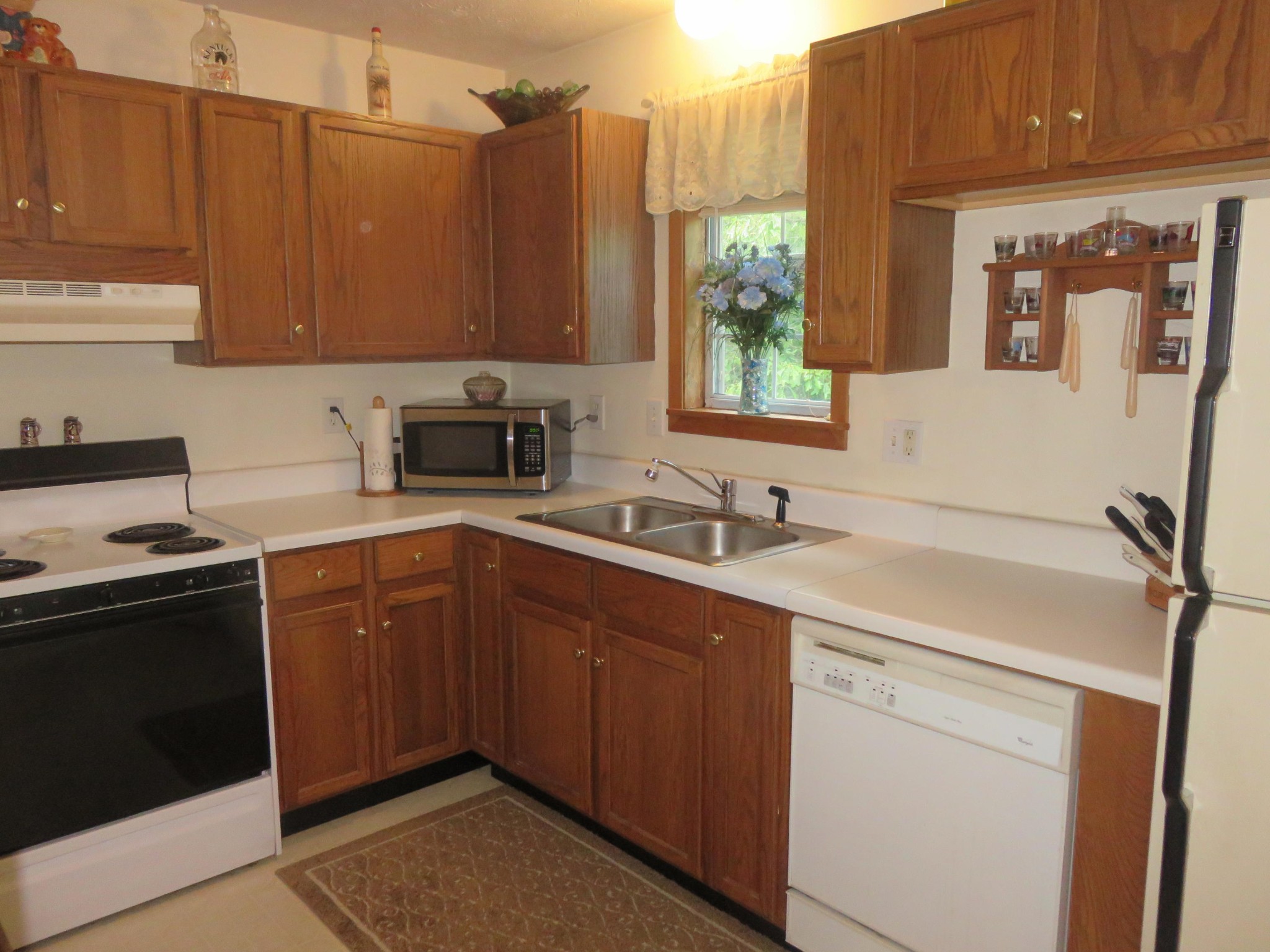 7800 Roberson Spring Road Loudon, TN 37774 - Photo 4 of 17 a kitchen with a sink stove and cabinets