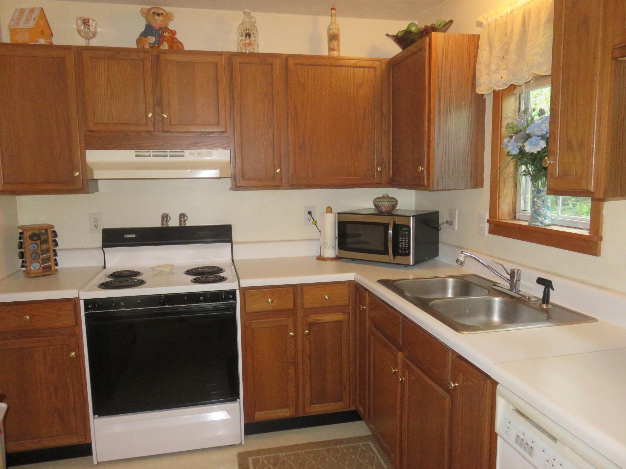 7800 Roberson Spring Road Loudon, TN 37774 - Photo 5 of 17 a kitchen with a sink stove and cabinets