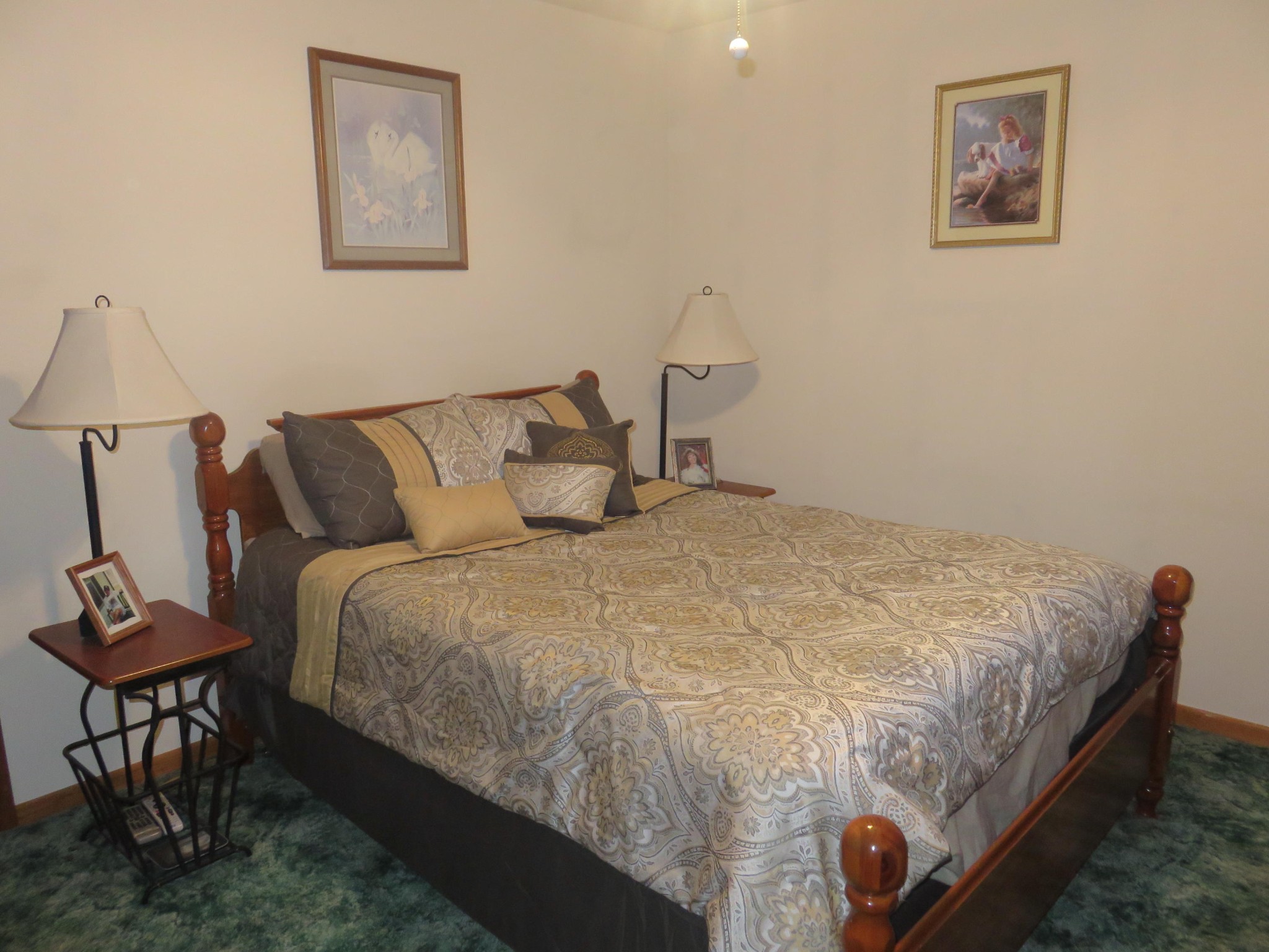 7800 Roberson Spring Road Loudon, TN 37774 - Photo 7 of 17 a large bed sitting in a bedroom next to a chair
