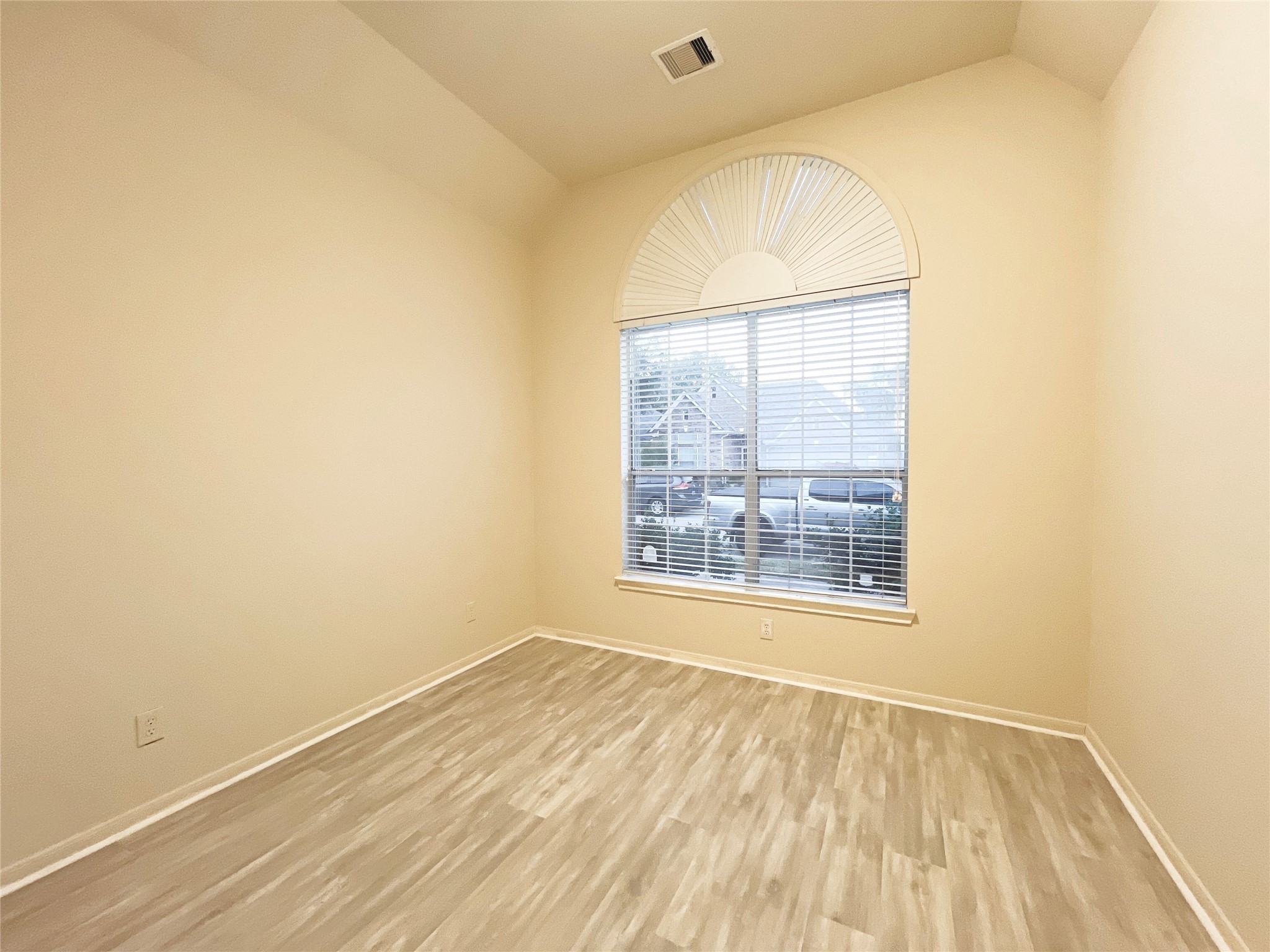 13306 South Point Lane Houston, TX 77034 - Photo 14 of 16 an empty room with wooden floor and windows