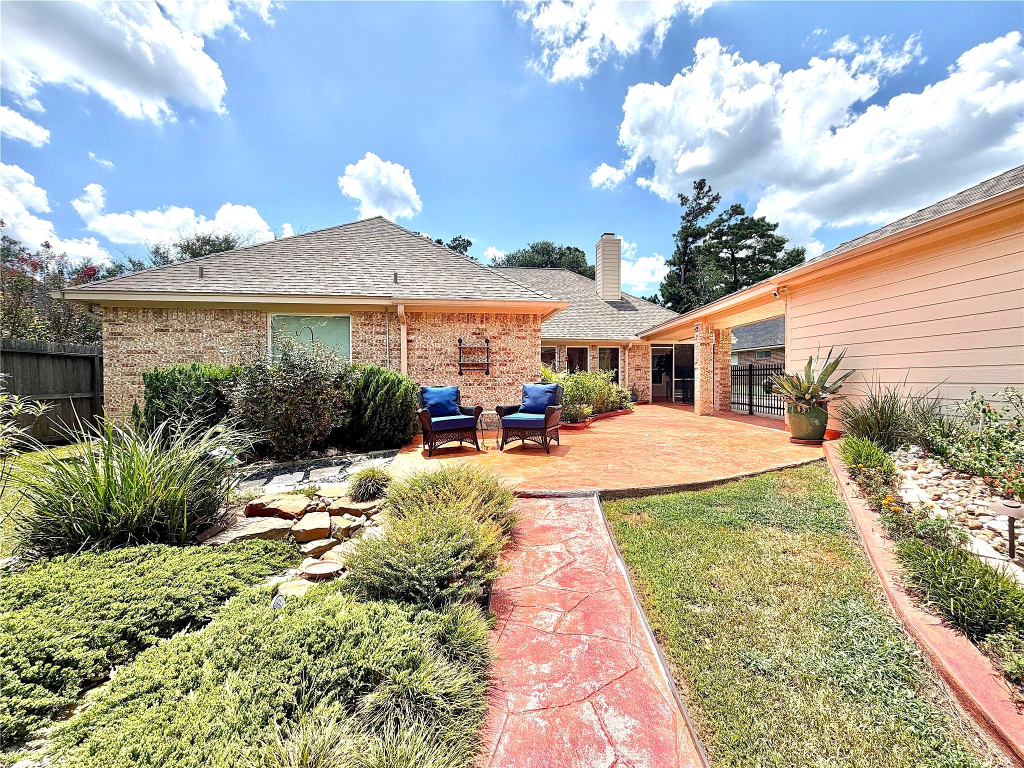 24818 Haverford Road Spring, TX 77389 - Photo 5 of 45 Park-like back yard with a gorgeous waterfall and fountain.