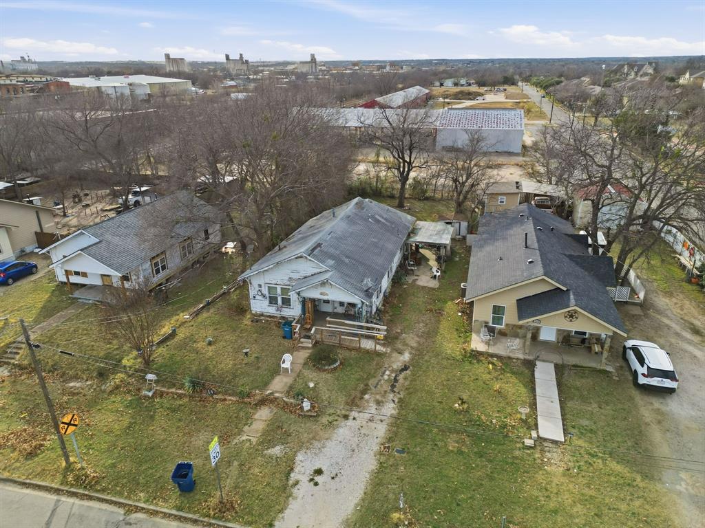 514 North Lee Street Sherman, TX 75090 - Photo 16 of 18 an aerial view of residential houses with outdoor space