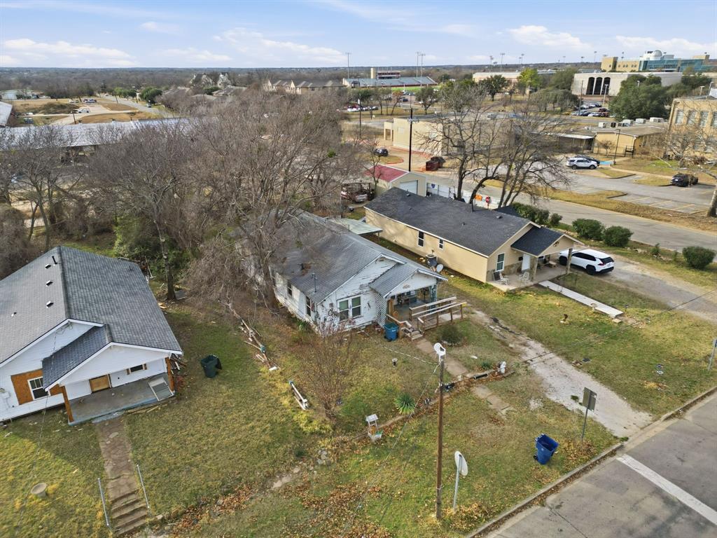 514 North Lee Street Sherman, TX 75090 - Photo 17 of 18 an aerial view of residential houses with outdoor space