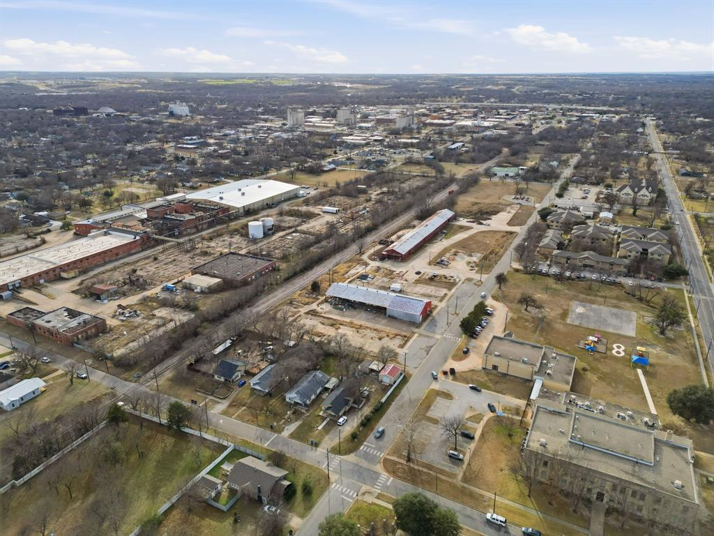 514 North Lee Street Sherman, TX 75090 - Photo 2 of 18 an aerial view of residential building with parking space