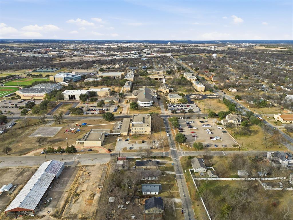 514 North Lee Street Sherman, TX 75090 - Photo 5 of 18 an aerial view of residential building with parking space