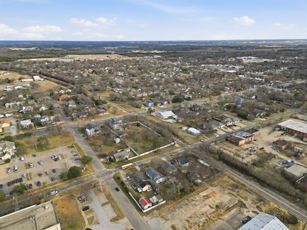 514 North Lee Street Sherman, TX 75090 - Photo 8 of 18 an aerial view of residential houses with outdoor space