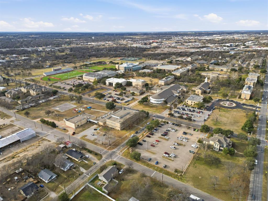 514 North Lee Street Sherman, TX 75090 - Photo 10 of 18 an aerial view of residential building with parking space