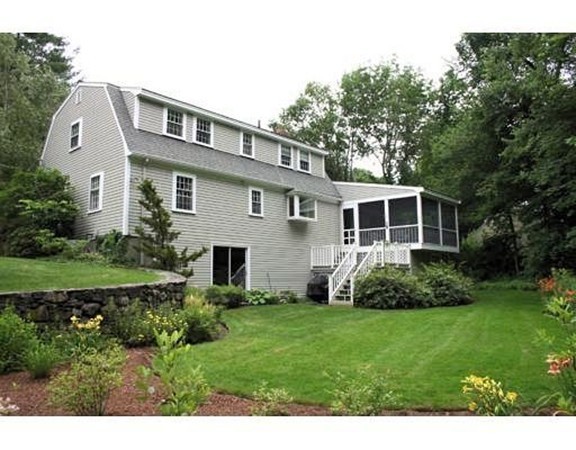 12 White Road Wayland, MA 01778 - Photo 3 of 21 a front view of house with yard and green space