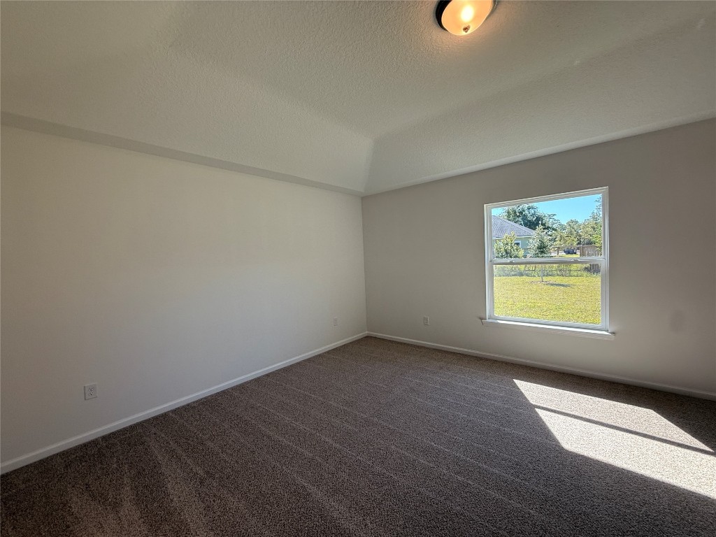 96076 Pirates Bluff Road Yulee, FL 32097 - Photo 12 of 22 a view of an empty room and window