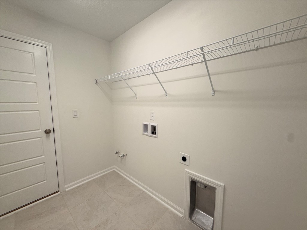 96076 Pirates Bluff Road Yulee, FL 32097 - Photo 14 of 22 a view of a room with racks on the wall