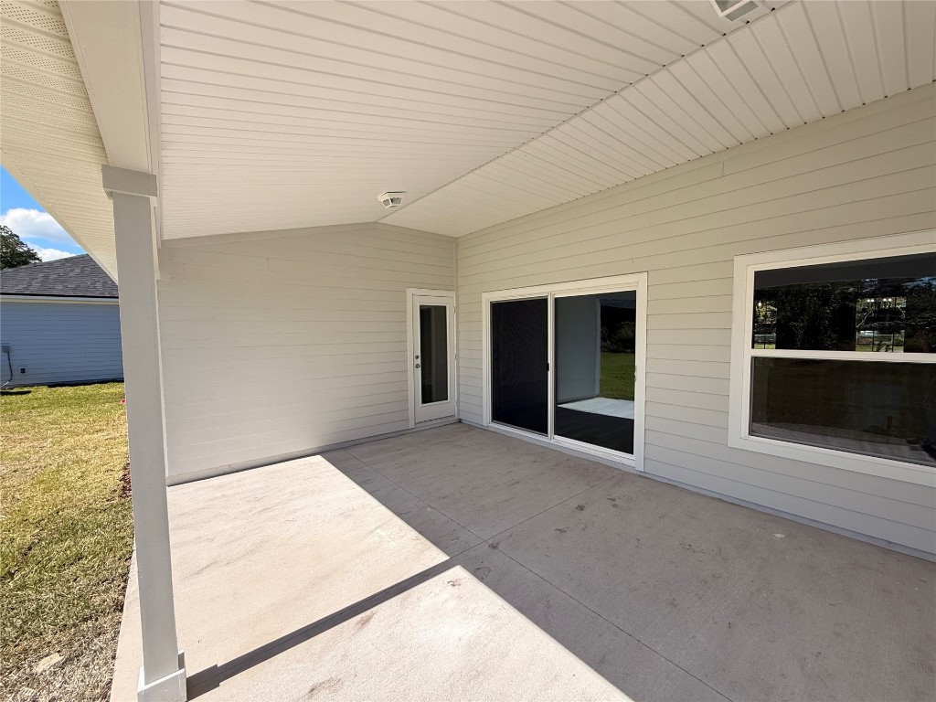 96076 Pirates Bluff Road Yulee, FL 32097 - Photo 22 of 22 a view of an empty room and window