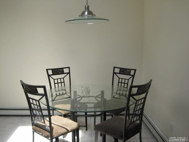 26 Ridge Drive East Roslyn, NY 11576 - Photo 12 of 28 a view of a dining room with furniture