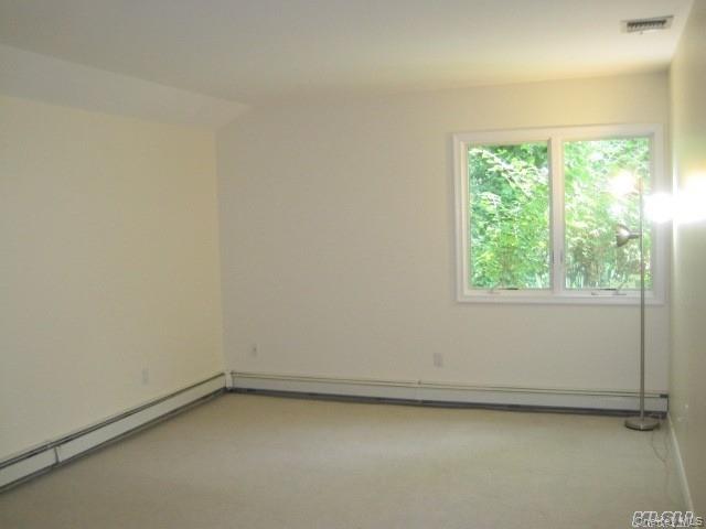 26 Ridge Drive East Roslyn, NY 11576 - Photo 21 of 28 a view of a room with a window