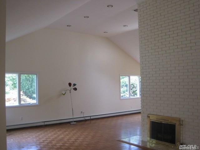 26 Ridge Drive East Roslyn, NY 11576 - Photo 5 of 28 a view of an empty room with a window