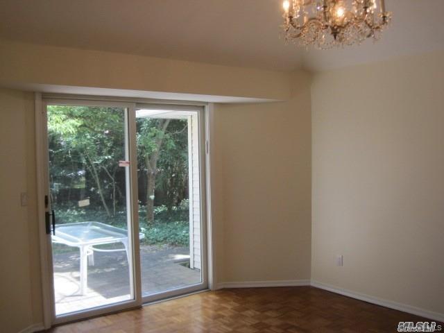26 Ridge Drive East Roslyn, NY 11576 - Photo 8 of 28 a view of a room with a large window
