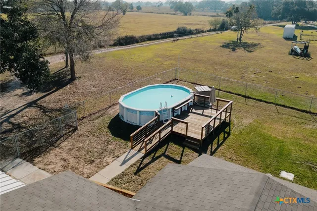 a ocean view with a bench and lake view