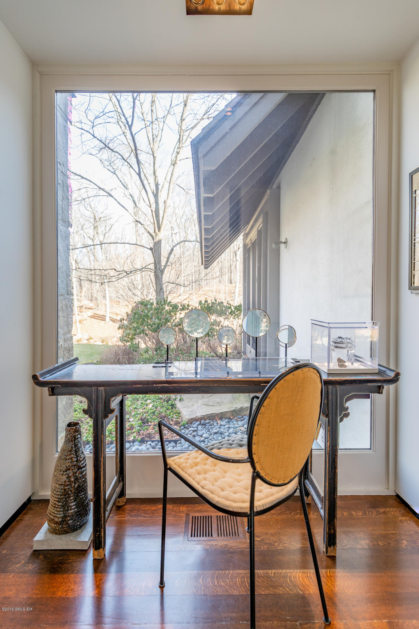 373 Riverbank Road Stamford, CT 06903 - Photo 13 of 35 a view of a room with furniture wooden floor and a window
