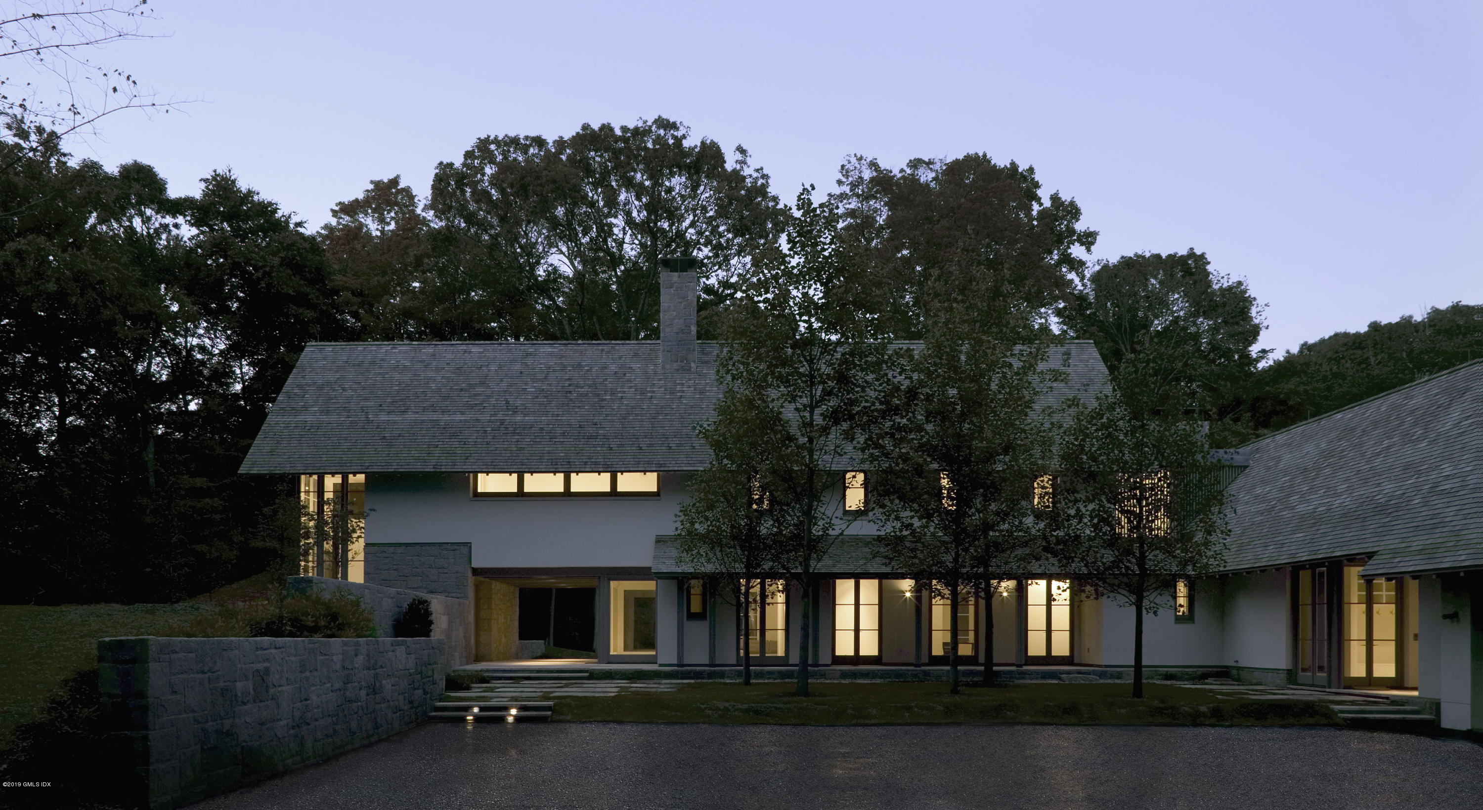 373 Riverbank Road Stamford, CT 06903 - Photo 23 of 35 an aerial view of house with yard and outdoor seating