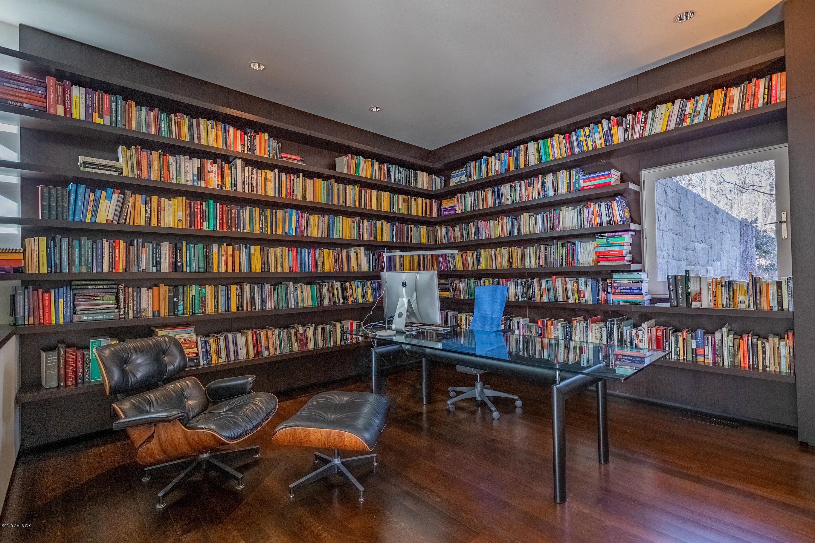 373 Riverbank Road Stamford, CT 06903 - Photo 32 of 35 a reading room with furniture book shelf and a book shelf