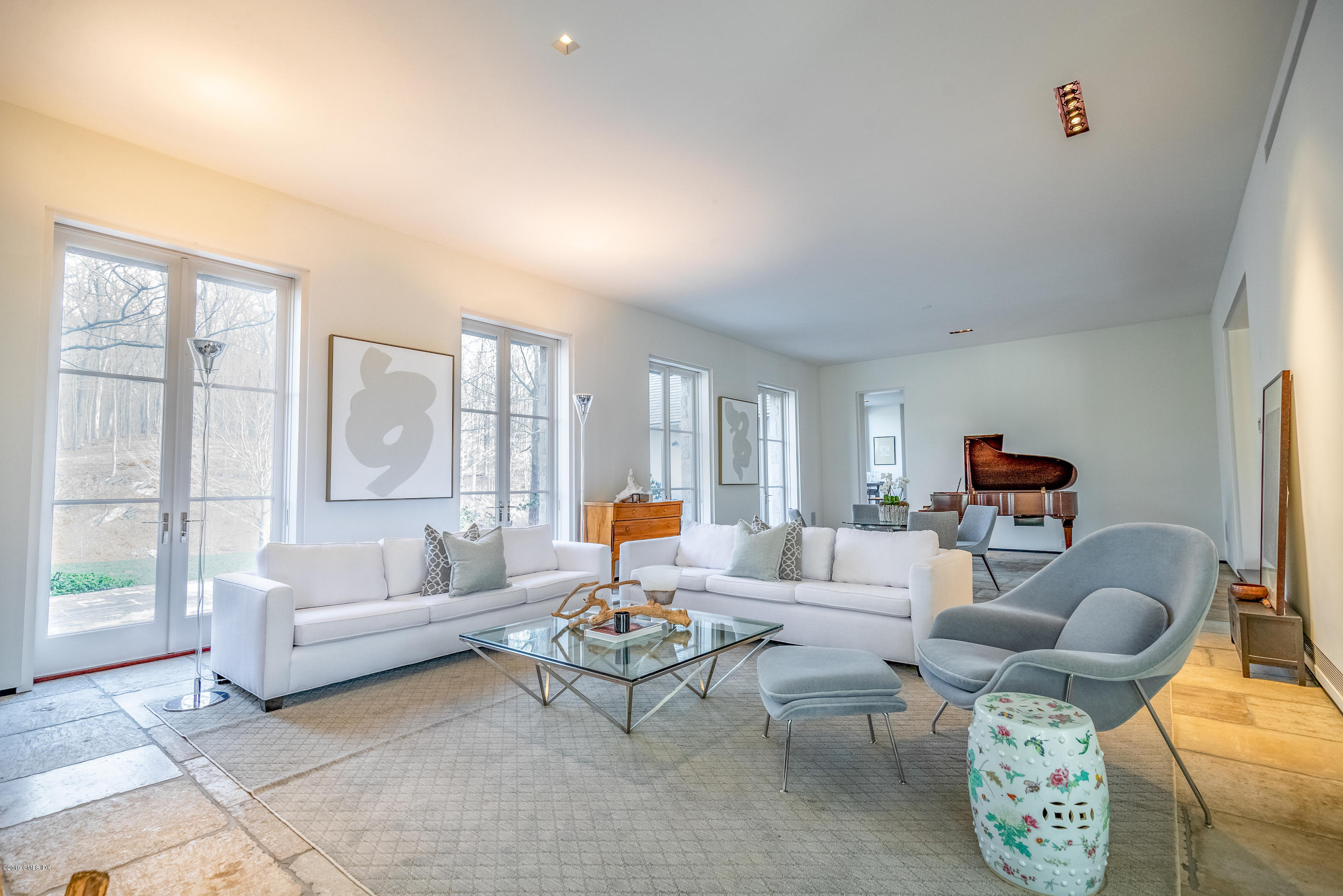 373 Riverbank Road Stamford, CT 06903 - Photo 4 of 35 a living room with furniture and a large window