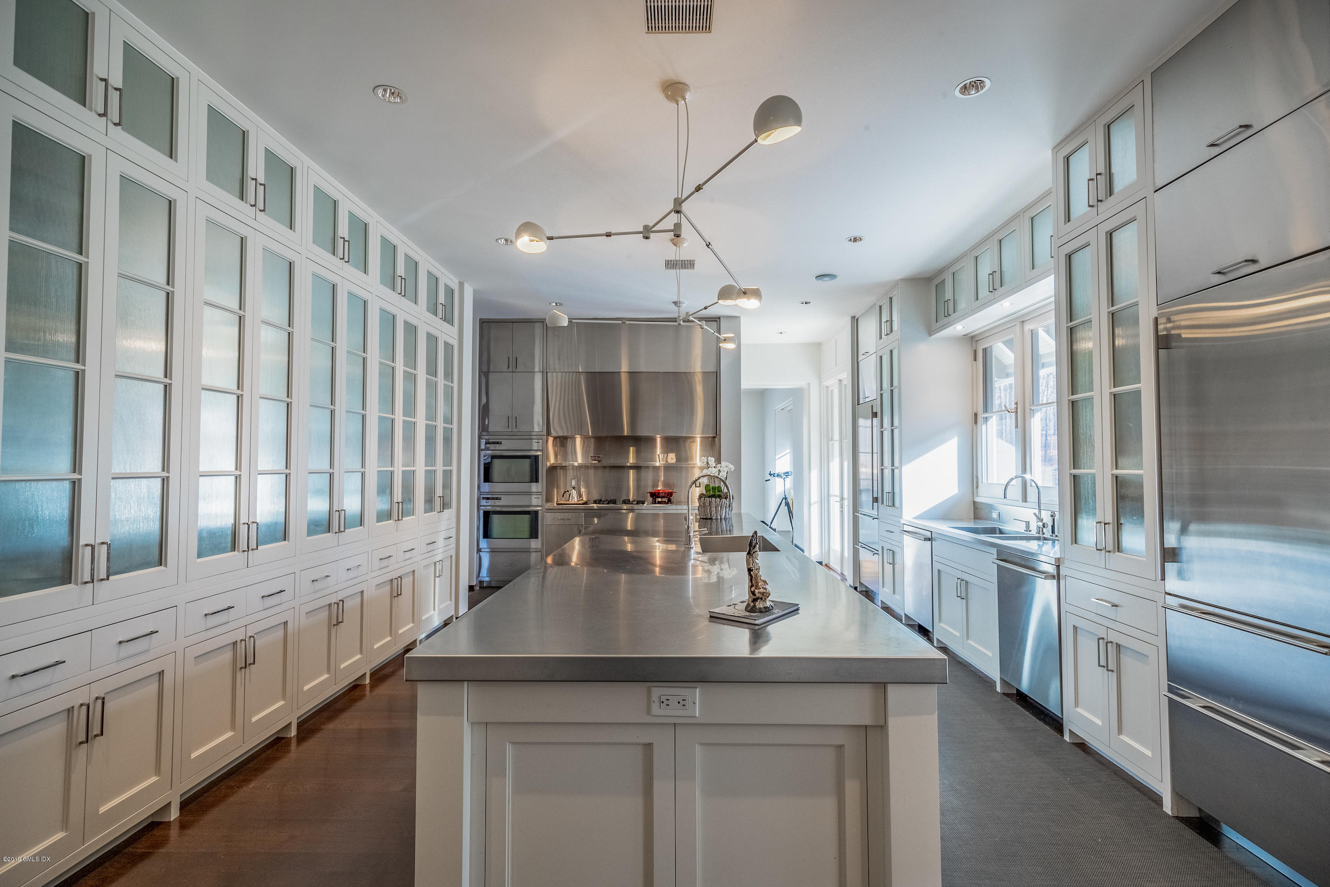 373 Riverbank Road Stamford, CT 06903 - Photo 6 of 35 a kitchen with lots of counter top space