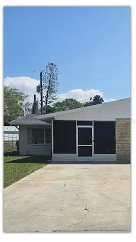 a view of a refrigerator in kitchen