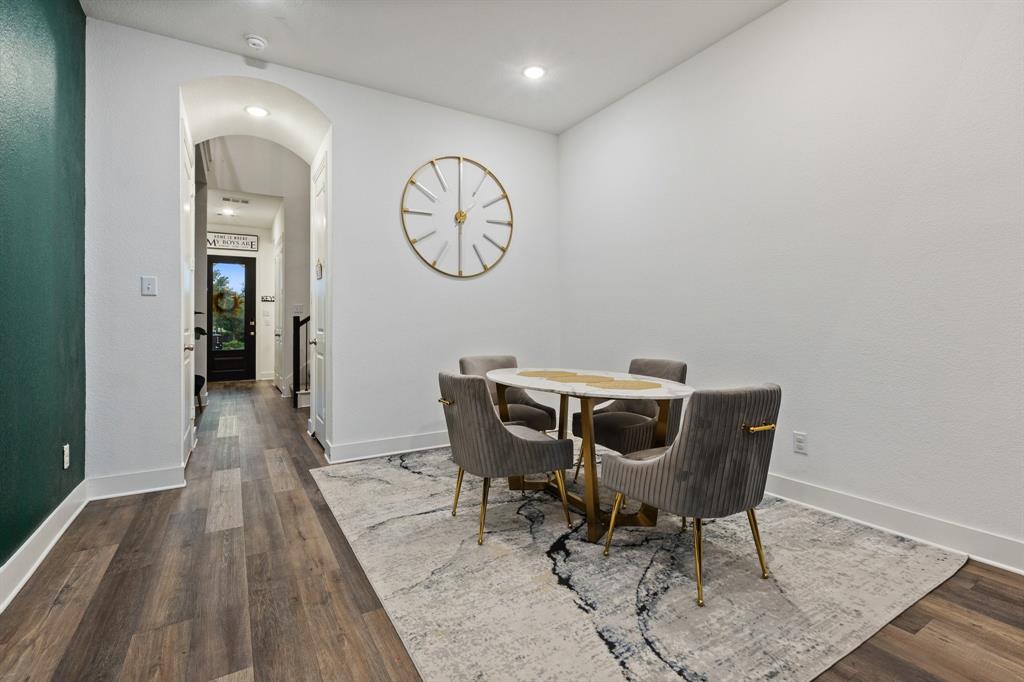 1124 Queensdown Way Forney, TX 75126 - Photo 12 of 34 a view of a hallway with seating area