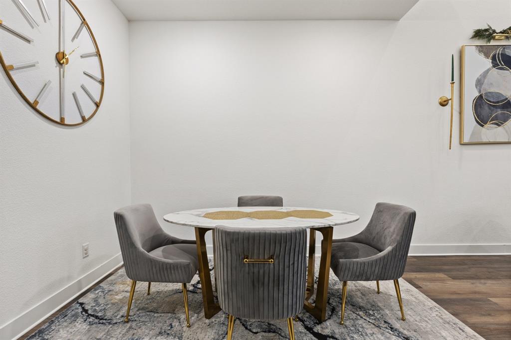 1124 Queensdown Way Forney, TX 75126 - Photo 13 of 34 a dining room with furniture and a mirror