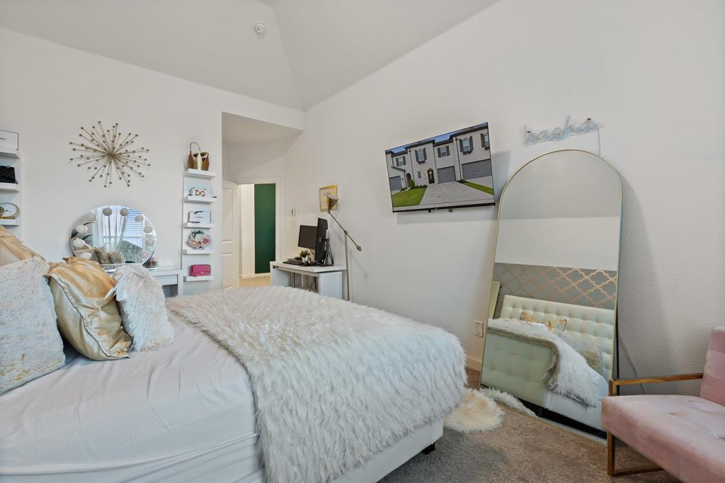 1124 Queensdown Way Forney, TX 75126 - Photo 17 of 34 a bedroom with a bed and a couch